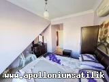 Apolloniumda Satılık Full Eşyalı, Köşe Konumlu 2 Yatak Odalı Eros Daire