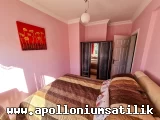 Apolloniumda Satılık Full Eşyalı, Köşe Konumlu 2 Yatak Odalı Eros Daire