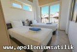 Apolloniumda Satılık Deniz ve Havuz Manzaralı Full Eşyalı 3+1 Daire